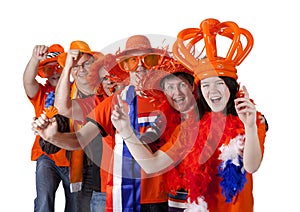 Group of Dutch soccer fans making polonaise over white background