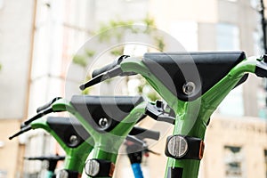 Group of E-scooters parked in the street in London