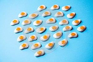 Group of egg shaped marmalade candies background. Top view