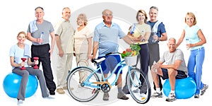 Group of elderly fitness people with bicycle.