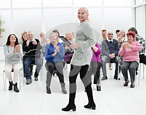 A group of elderly people admire you success in the conference r