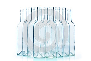 Group of empty glass bottles isolated on white