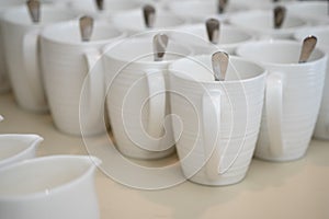 Group of empty white ceramic cups