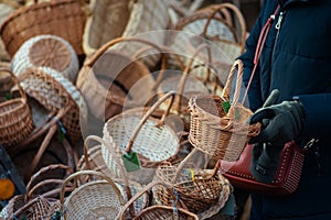 Group of empty wicker baskets for sale in a street market or traditional fair