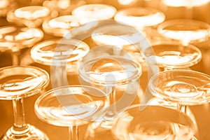 Group of empty wine glass upside down in row sepia tone