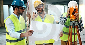 Group of engineering team had meeting at working site