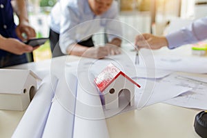 Group of engineers working together to plan the project at the meeting