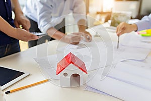 Group of engineers working together to plan the project at the meeting