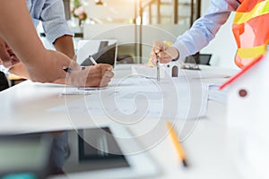 Group of engineers working together to plan the project at the meeting