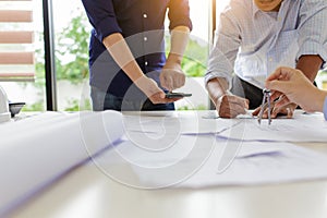 Group of engineers working together to plan the project at the meeting