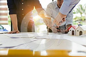 Group of engineers working together to plan the project at the meeting