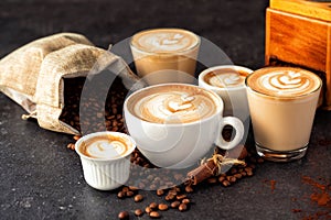 Group of espressos in all sizes photo