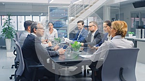 Group of Executives, Lawyers, Businesspeople and Investors Gather at the Table in Corporate Meetin