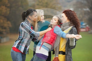 Group Of Female Teenagers Bullying Girl