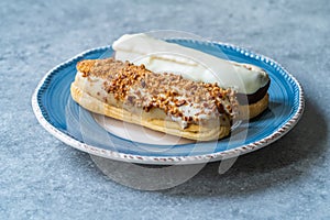 Group of Fench Delicious Dessert Eclairs in Plate