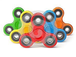 Group of fidget finger spinner stress, anxiety relief toy isolated on white background.