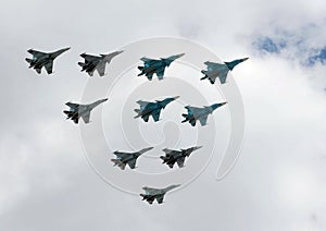 A group of fighter planes su-34, su-27 and SU-35S photo