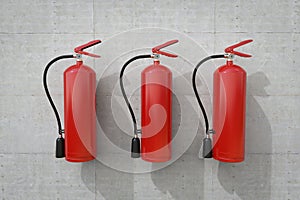 Group of fire extinguishers handing on wall