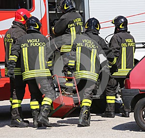 Group of firefighters working as a perfect teamwork