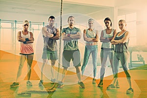 Group fitness, portrait and people at gym for exercise, workout and training goals. Serious men and women team with arms