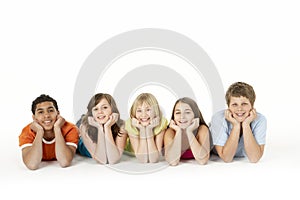 Group Of Five Young Children In Studio