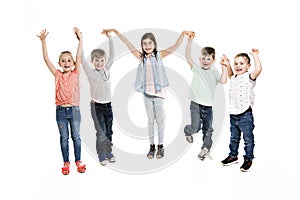 Group Of five Young Children In Studio