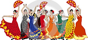 Group of flamenco dancers in colorful traditional spanish dresses