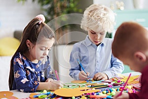 Focused children during art class