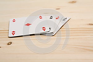 A group of four playing card aces