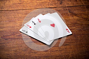 A group of four playing card aces