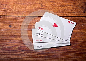 Group of four playing card aces