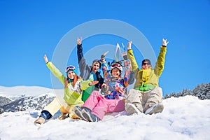 Group of four snowboarders