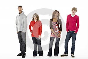 Group Of Four Teenagers In Studio