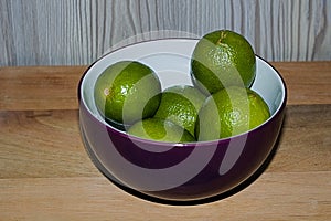 Grocerys Group Of Fresh Green Ripe Limes In A Bowl