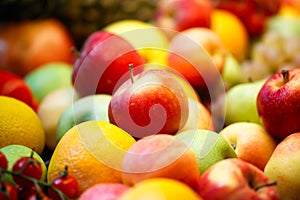 Group of fresh red green apples  orange at the supermarket. Fresh fruit background