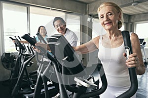 Group friend of senior runner at gym fitness smiling and happy.