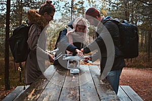 Group or friends are assembling drone