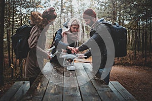 Group or friends are assembling drone