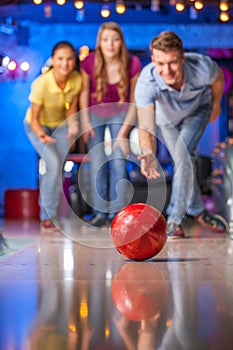 Group of friends bowling.