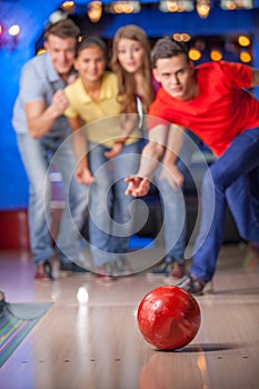 Group of friends bowling.