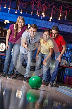 Group of friends bowling.