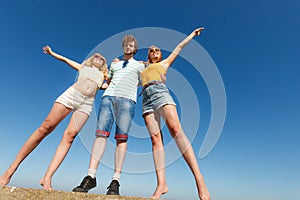 Group friends boy two girls having fun outdoor