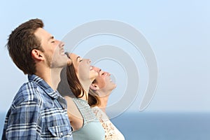 Group of friends breathing deep fresh air photo