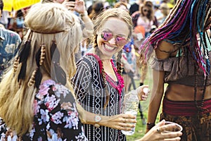 Group of Friends Drinking Beers Enjoying Music Festival together