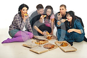 Group of friends eating pizza