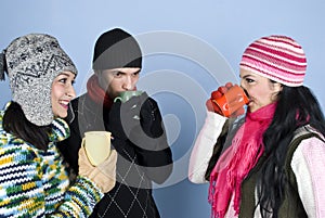 Group friends enjoying a hot drink together