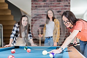 Group of friends enjoying snooker game