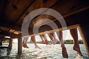 Group of friends enjoying the summer break on the river