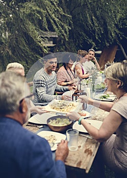 Group of friends are having a dinner together