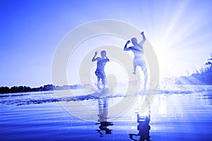 Group of friends having fun on the beach